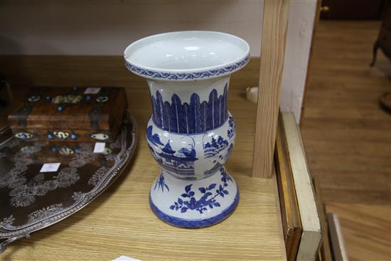 A 19th century Chinese blue and white vase, of Gu form, H. 13in.